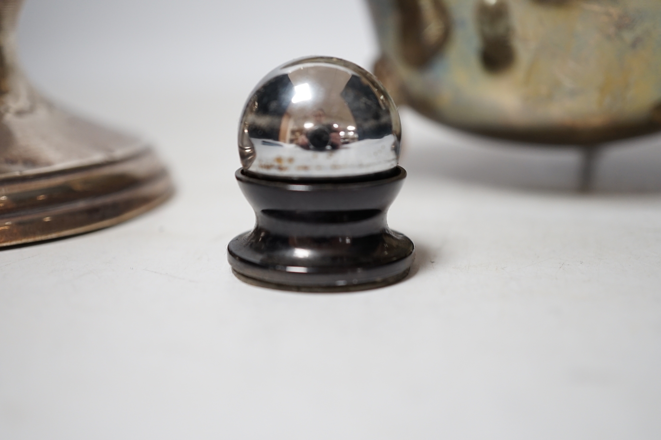 A 1930's silver sauceboat a silver mounted inkwell and one other item.
